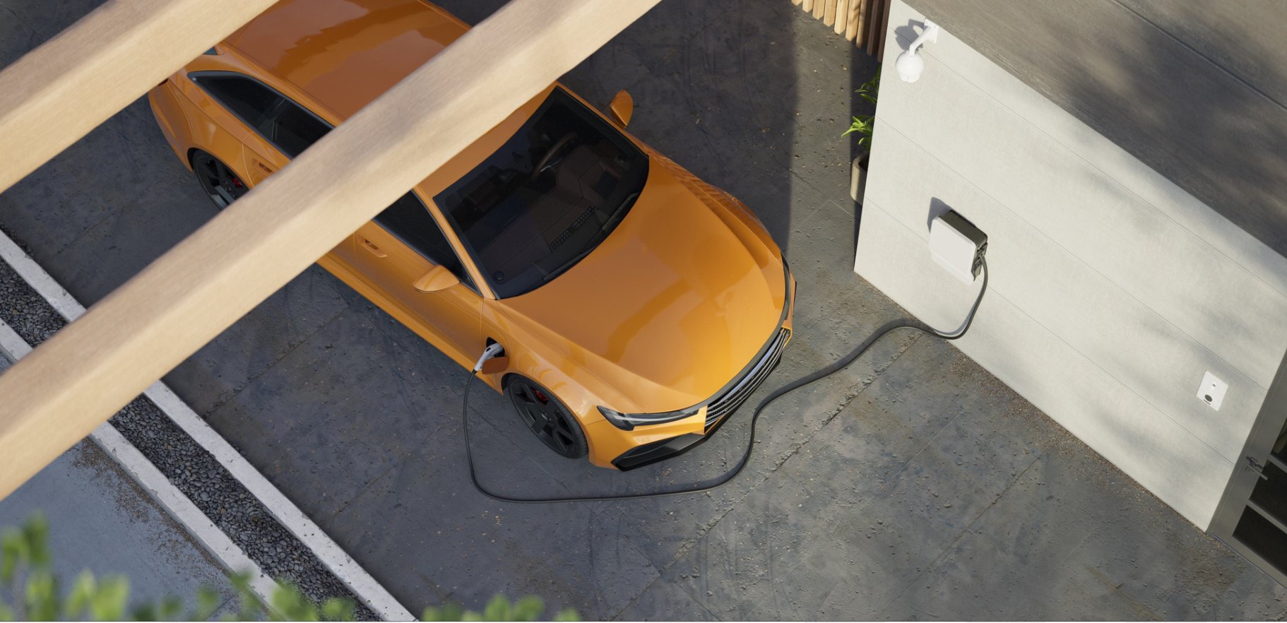 Auto elettrica in ricarica su una wallbox domestica